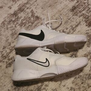 Nike Women's  White Sneakers with Black Swoosh